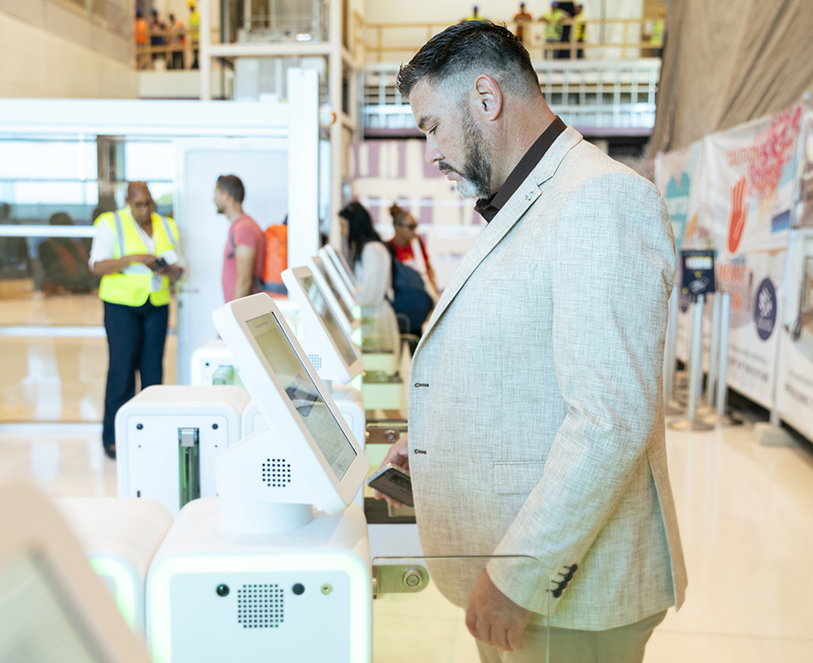 a man standing in front of a machine