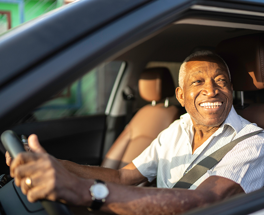 a man driving a car