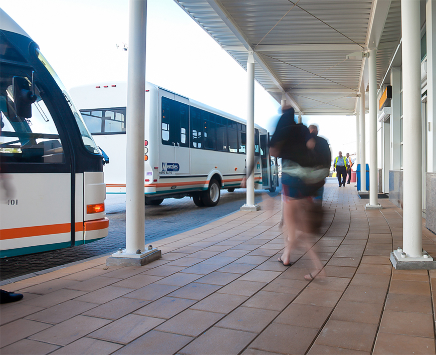 a person walking on a sidewalk