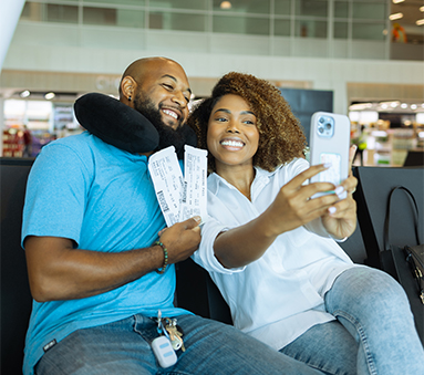 a man and woman taking a selfie