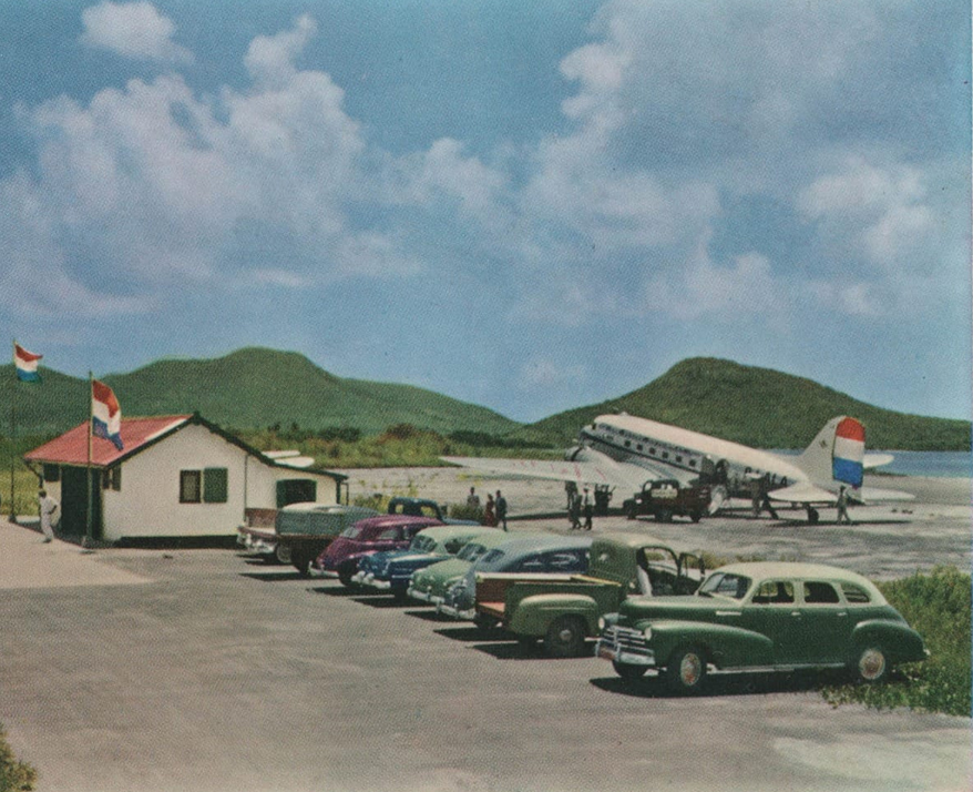 a group of cars parked in a parking lot