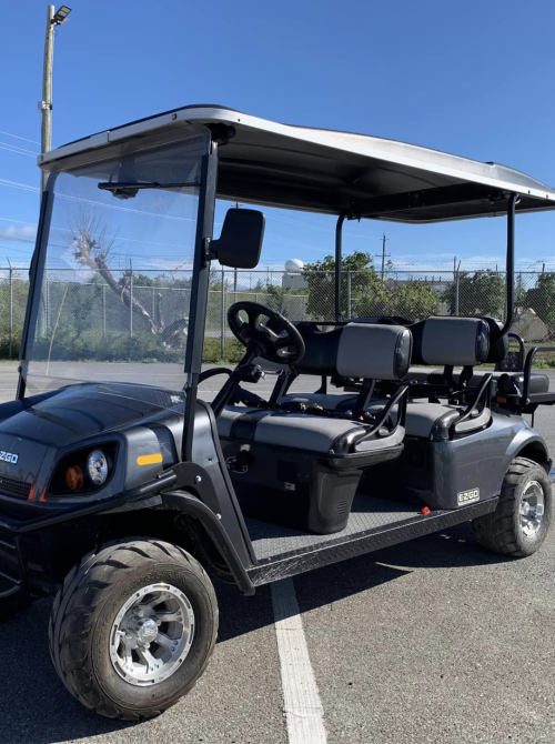 a golf cart parked in a parking lot