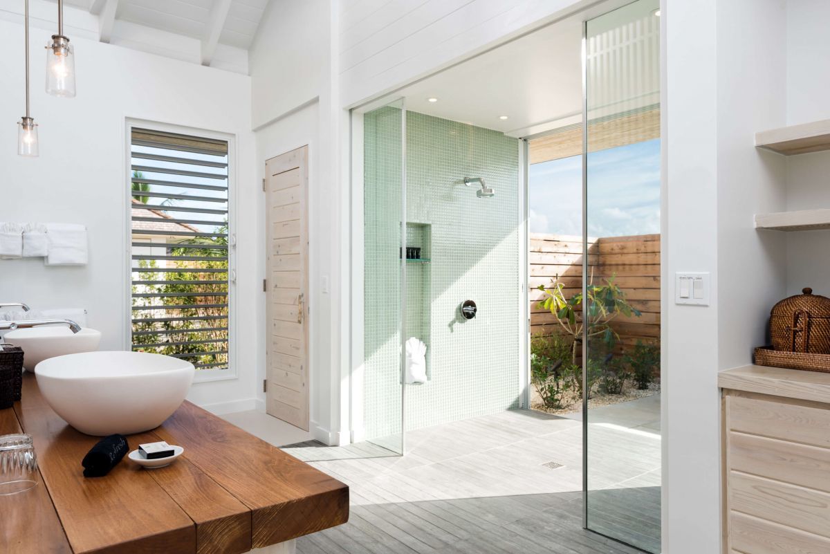 a bathroom with a sink and shower