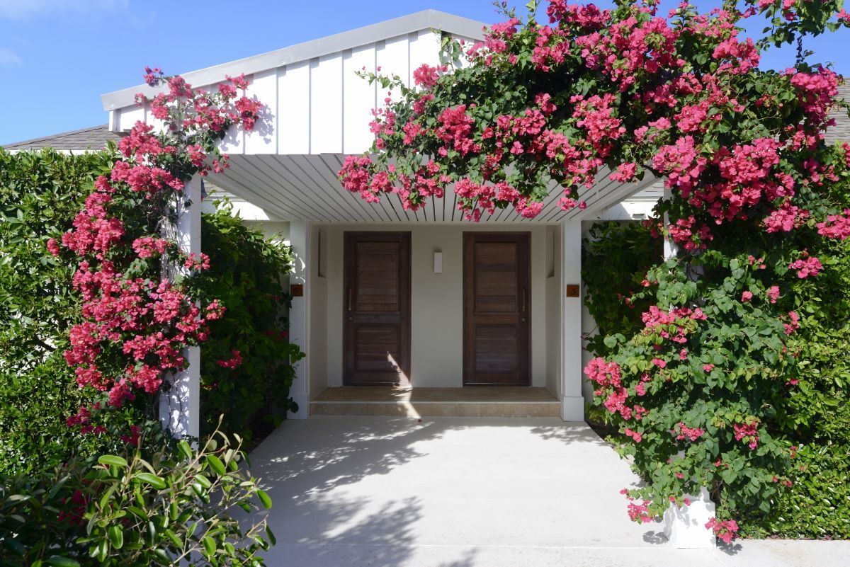 a house with pink flowers