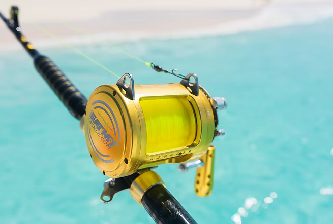 a fishing rod with a yellow reel
