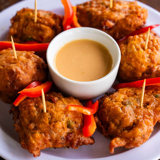 a plate of fried food with sauce