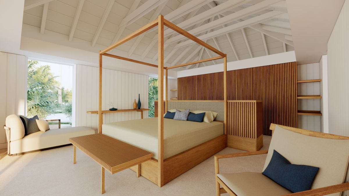 a room with a bed and chairs