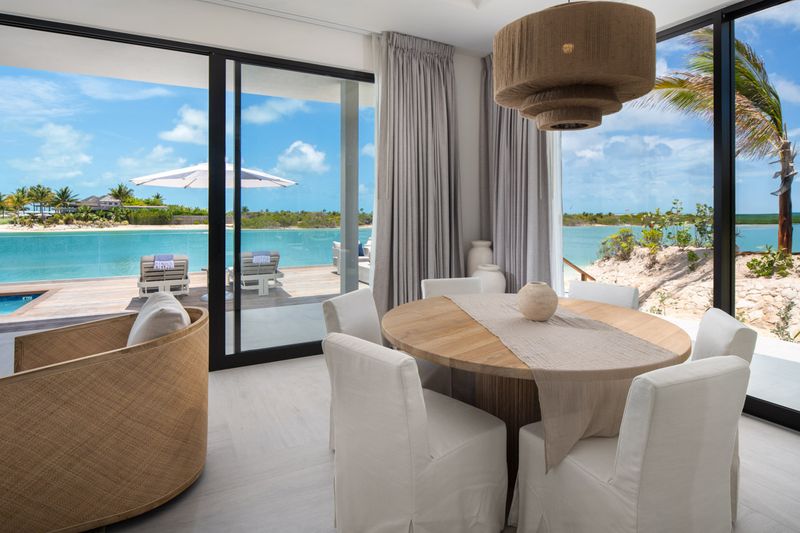 a room with a table and chairs