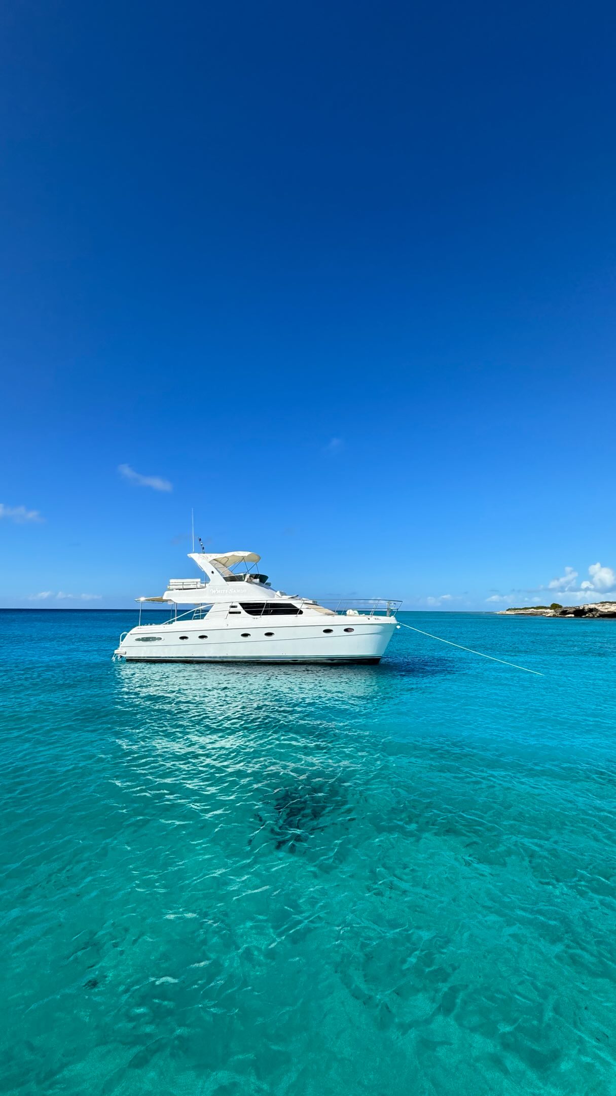 a white boat in the water