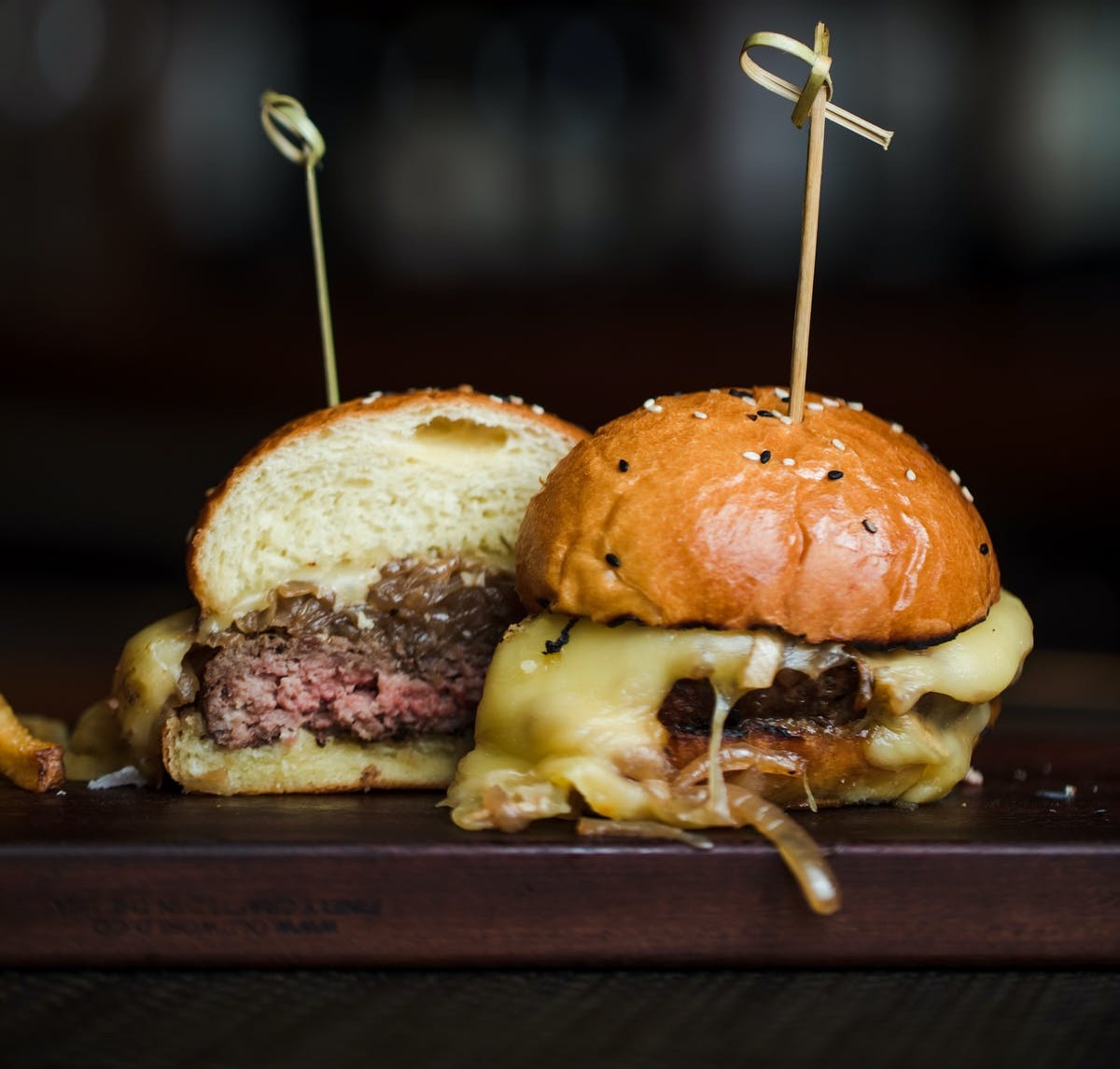 a burgers with toothpicks on top