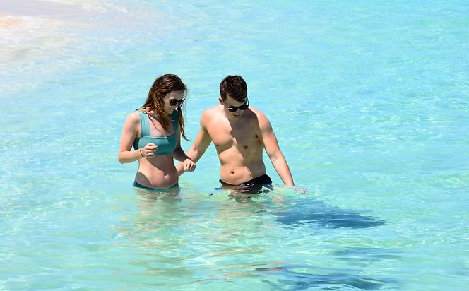 a man and woman in water