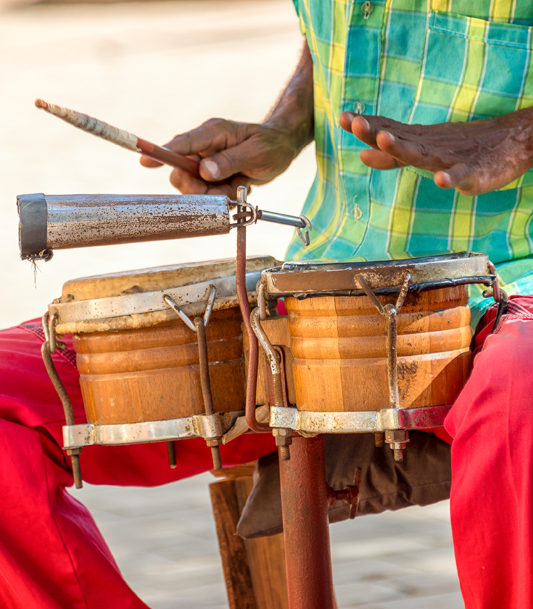 a man playing a drum