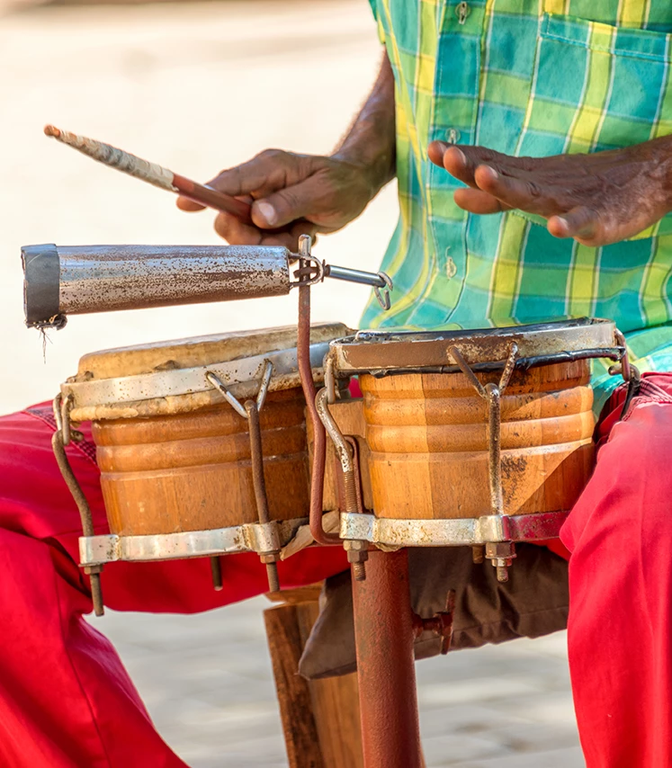 a man playing a drum