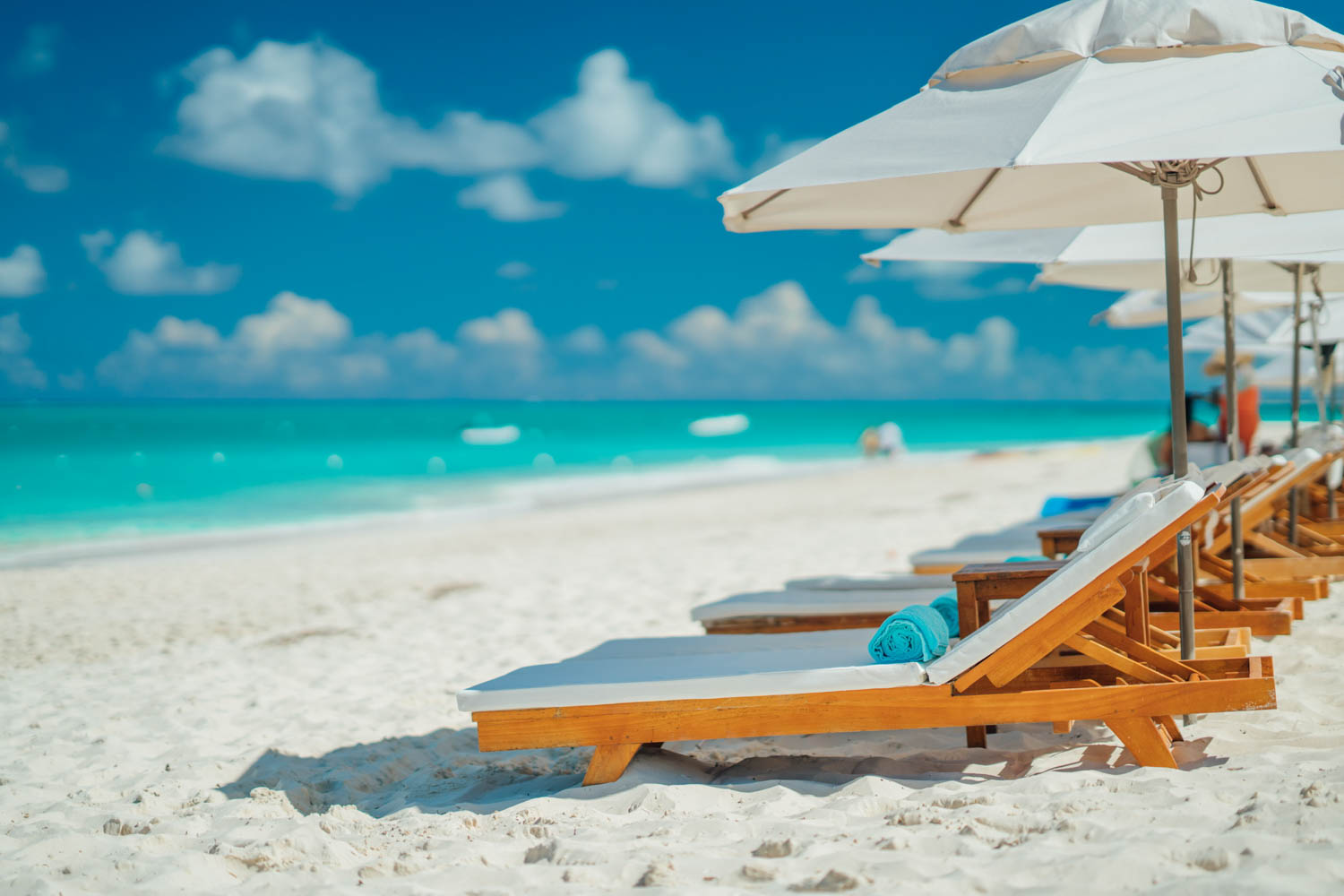 chairs and umbrellas on a beach