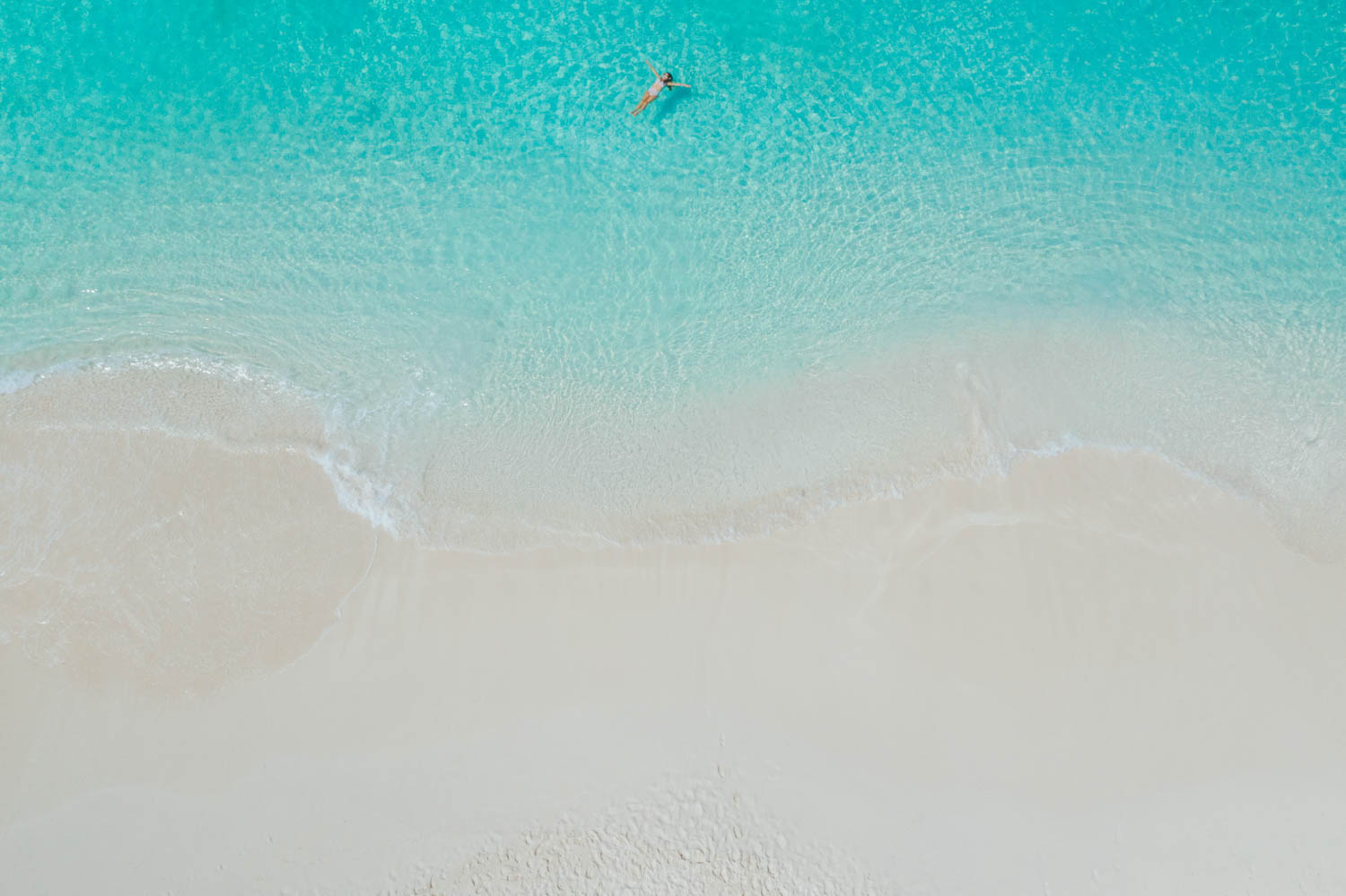 a person swimming in the water