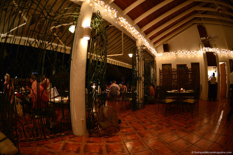a room with a large open gate and lights