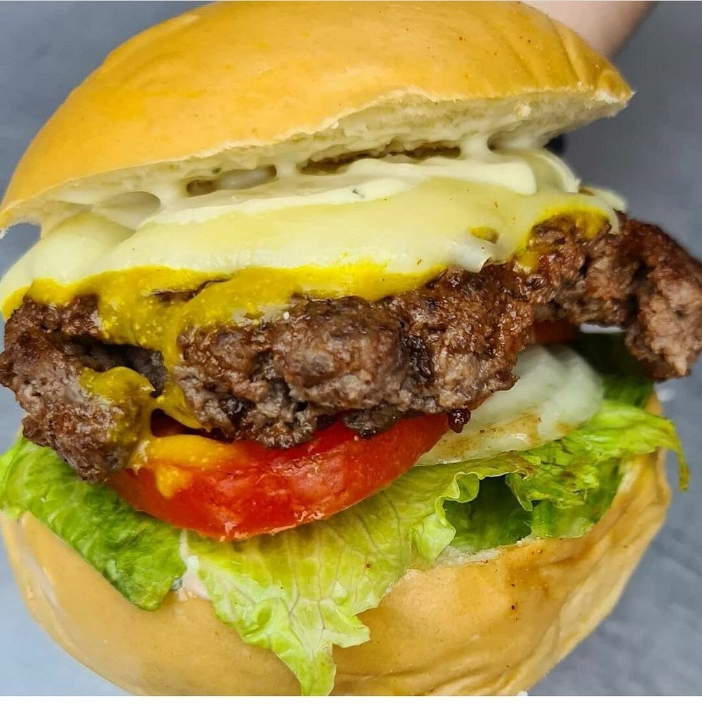 a close up of a burger