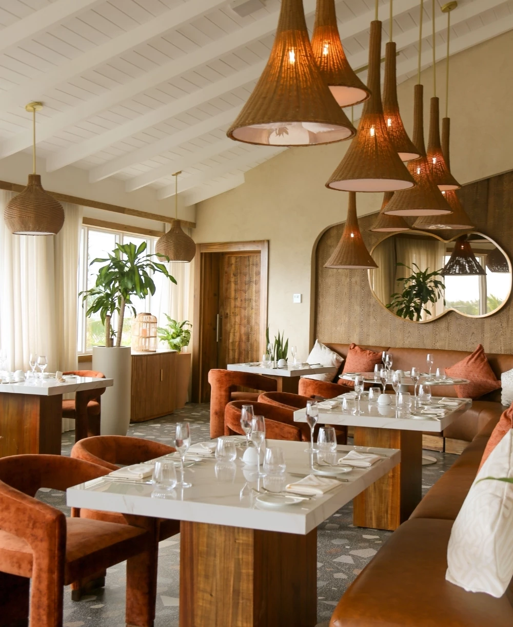 a room with tables and chairs
