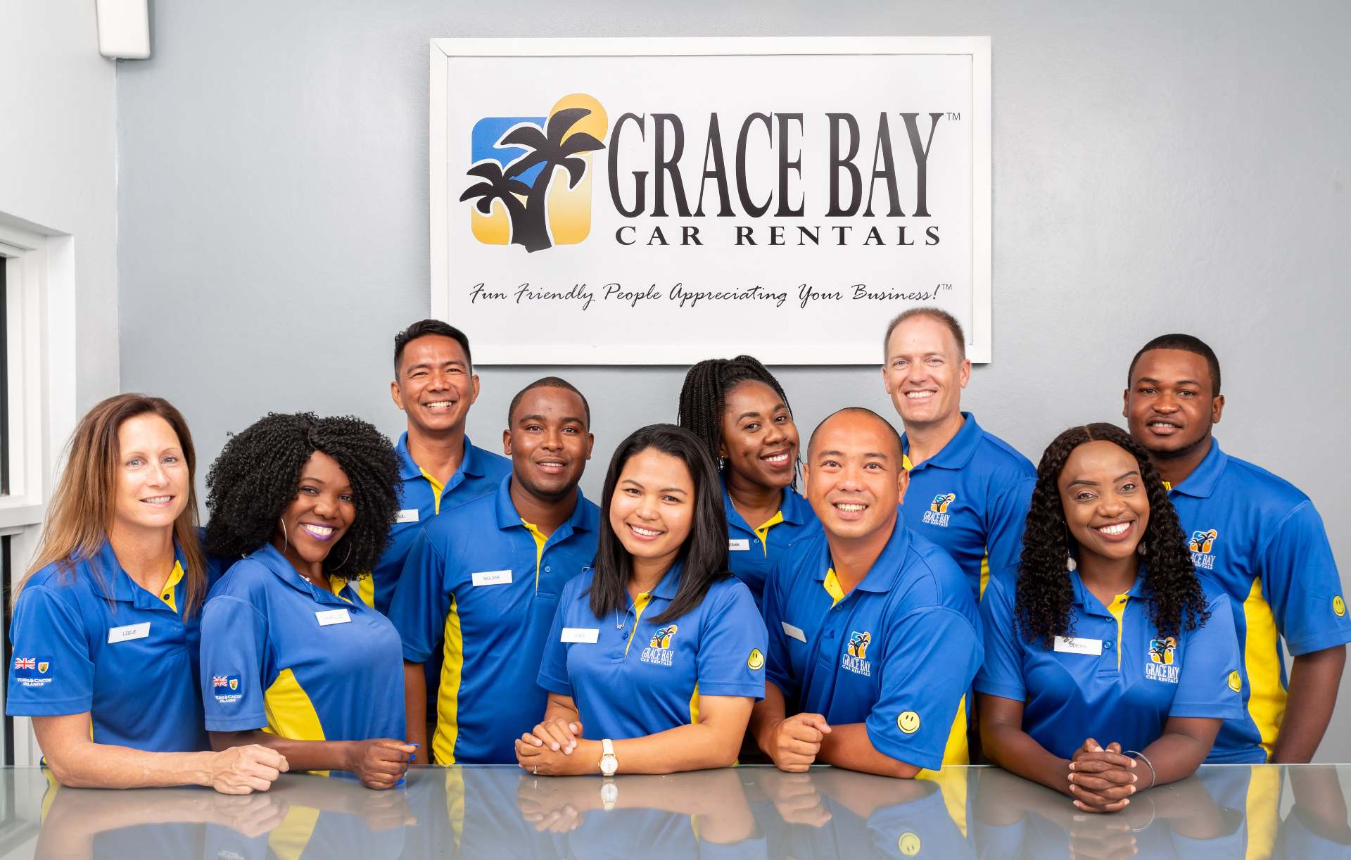a group of people in blue shirts