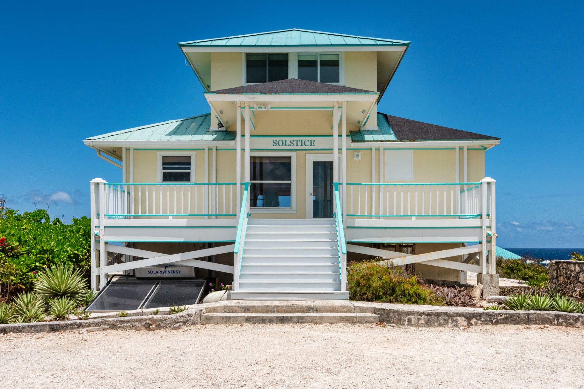 a building with stairs and a porch