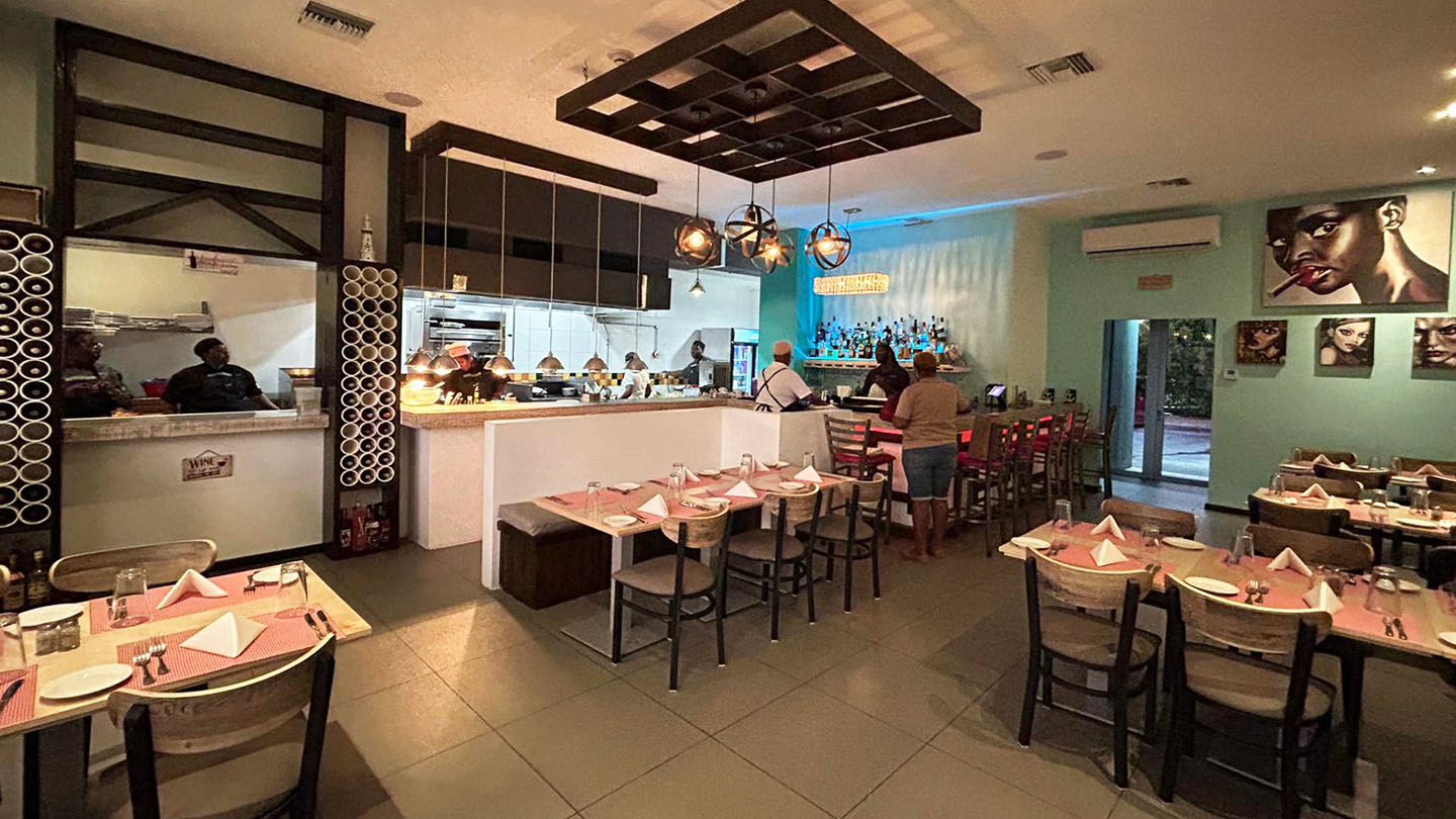 a restaurant with tables and chairs