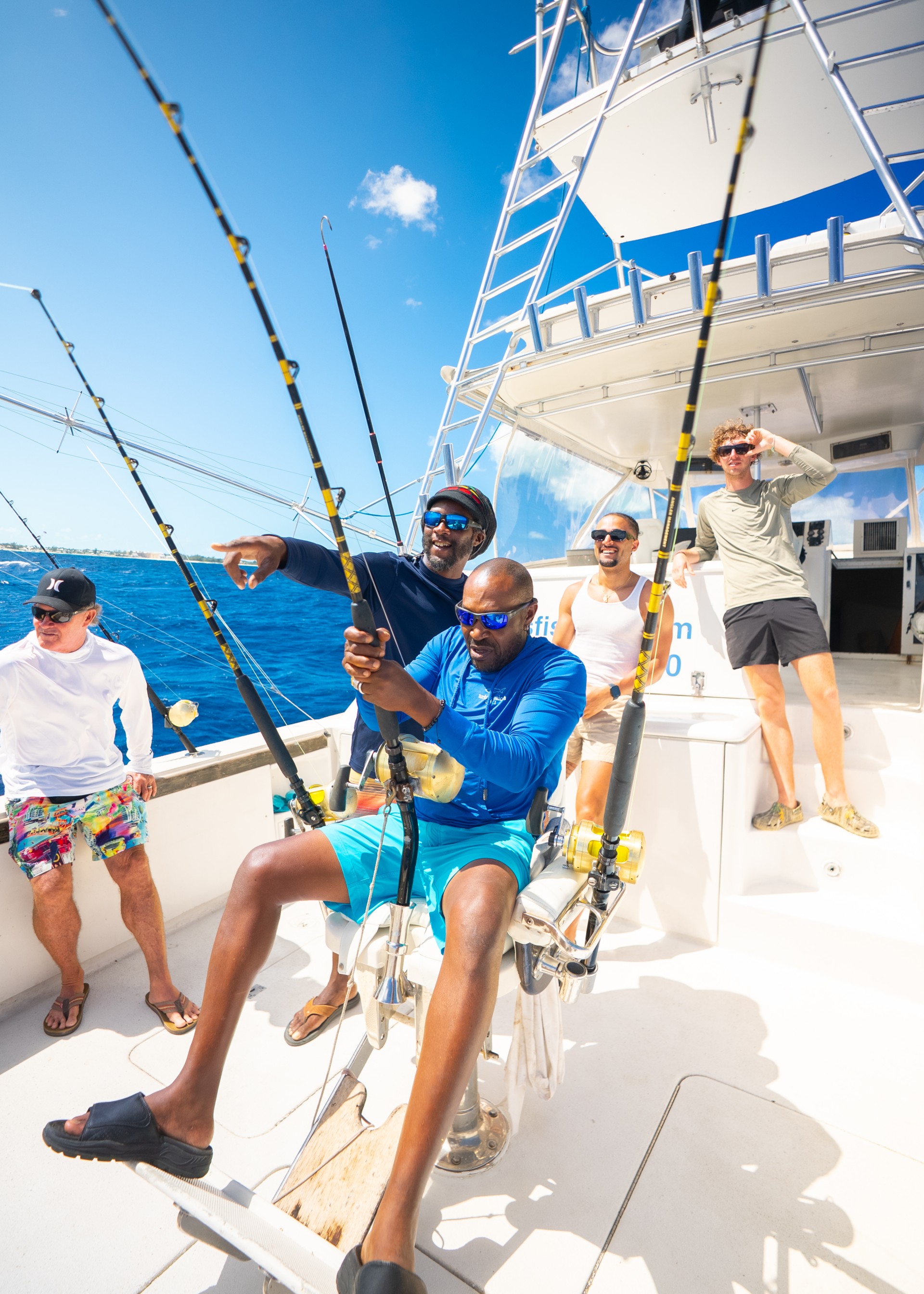 a group of people on a boat fishing