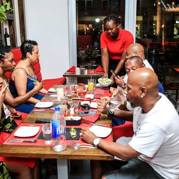 a group of people sitting at a table