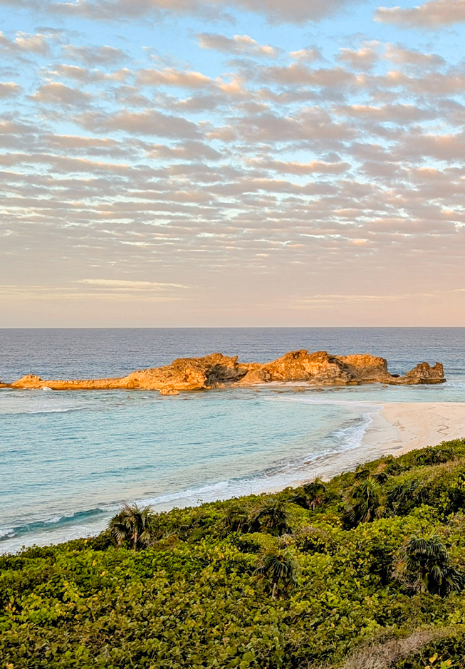 a rocky island in the ocean