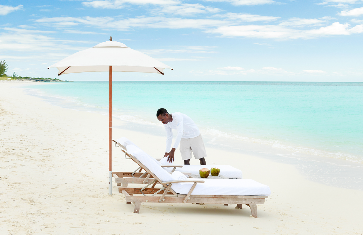 a man setting up a beach chair