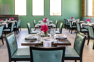 a restaurant with tables and chairs