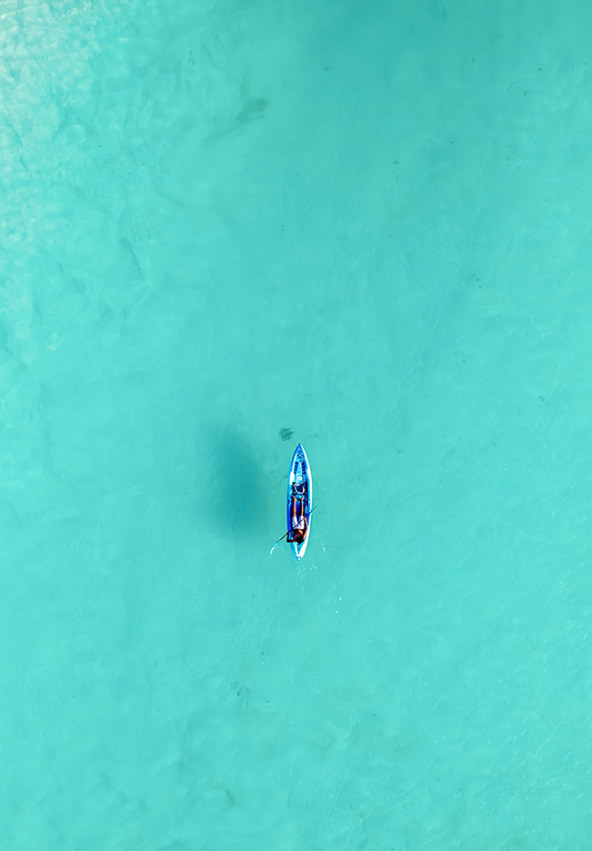 a person in a kayak in the water