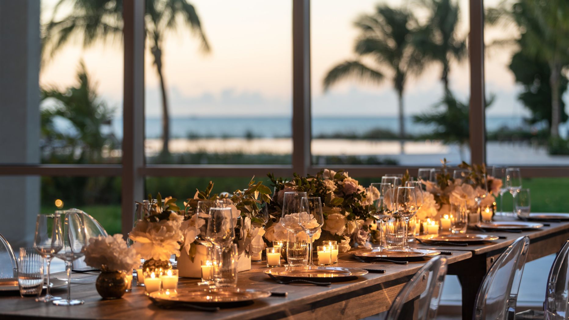 a table with candles and flowers