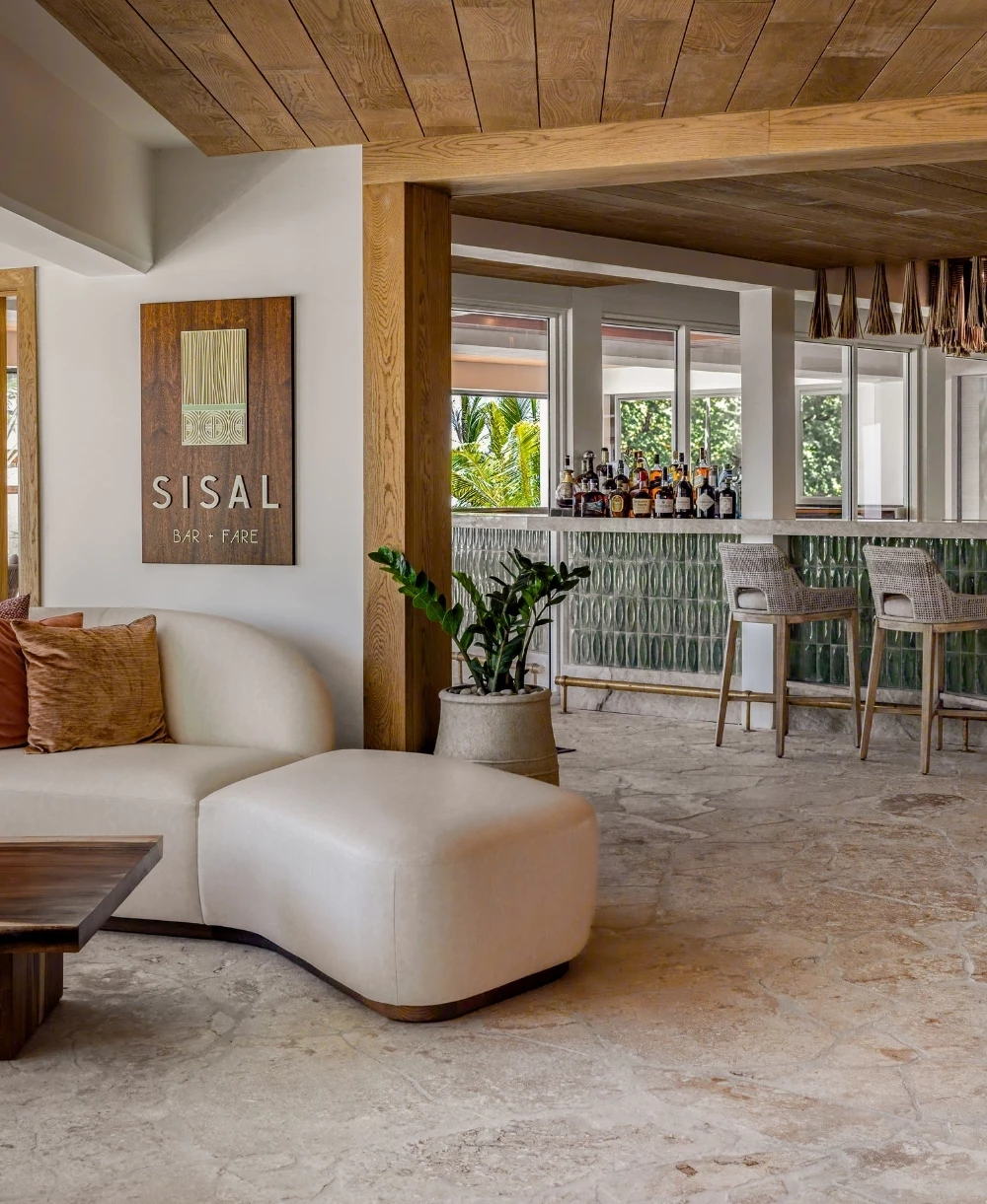 a room with a bar and a couch