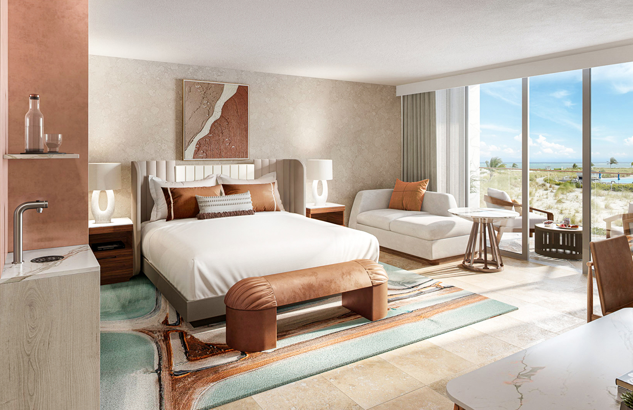 a bedroom with a bed and a couch