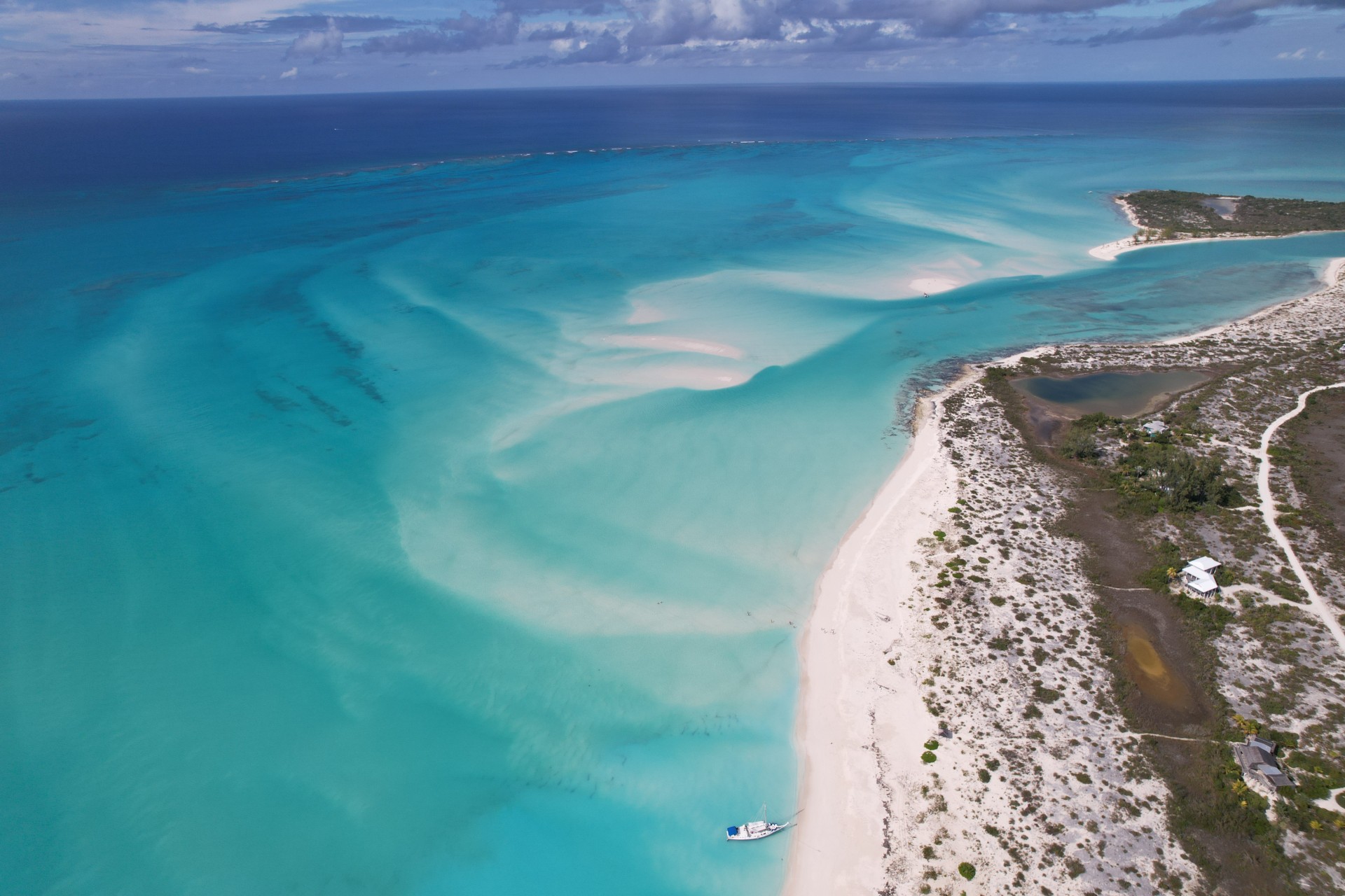 a beach with a boat on it