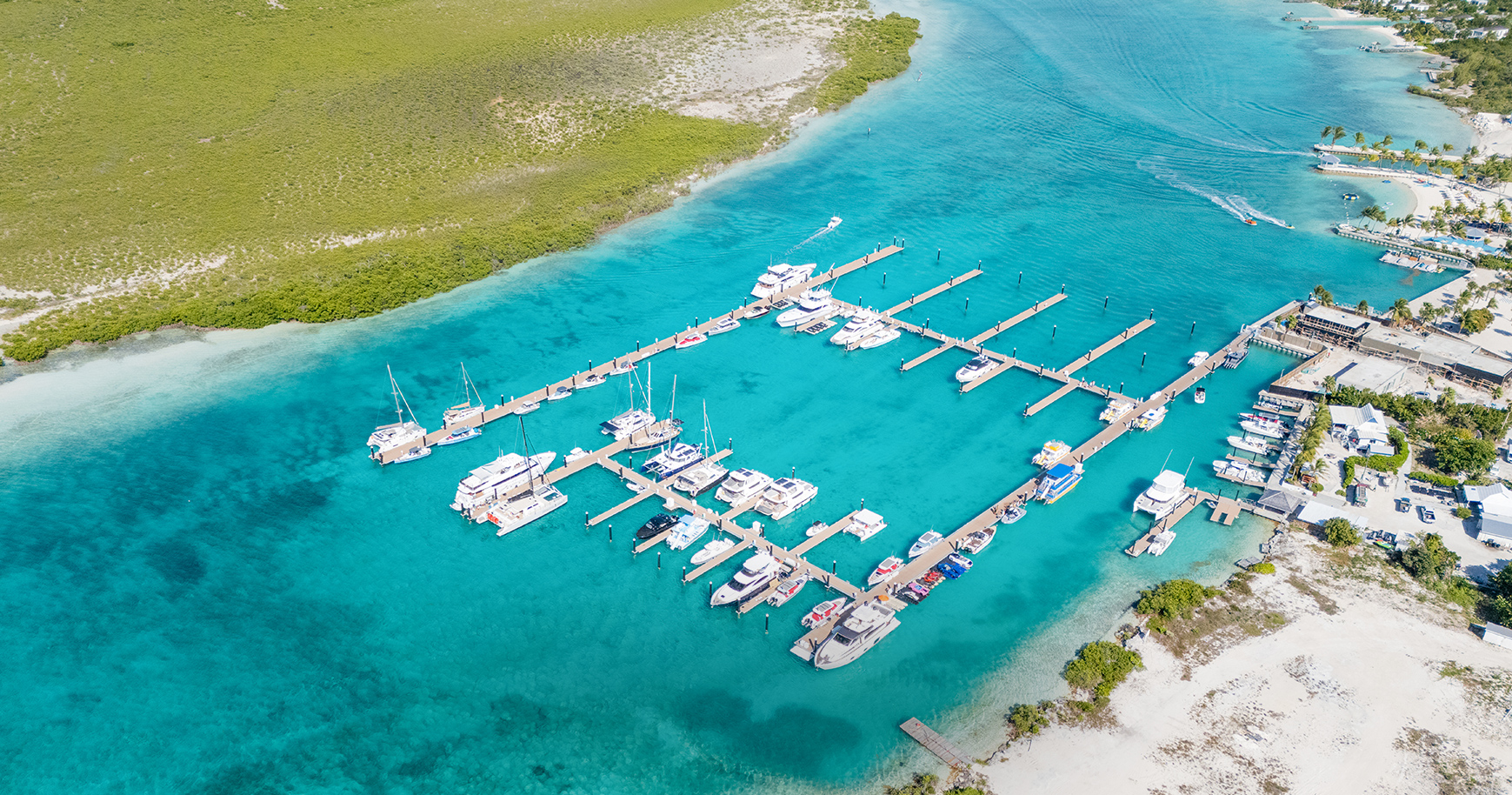 a group of boats in a marina