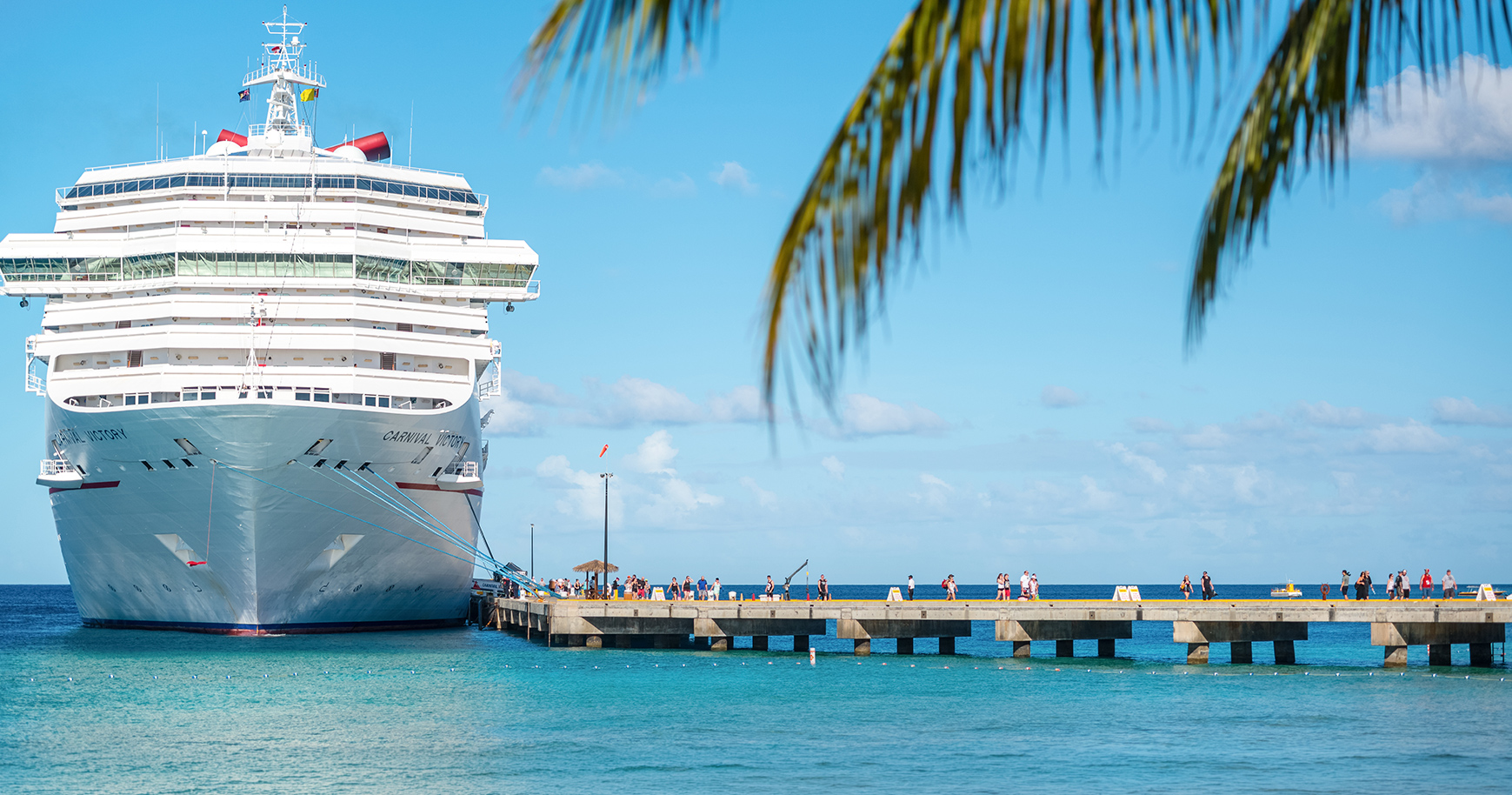 a cruise ship docked at a dock