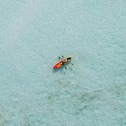 a person in a kayak on the water