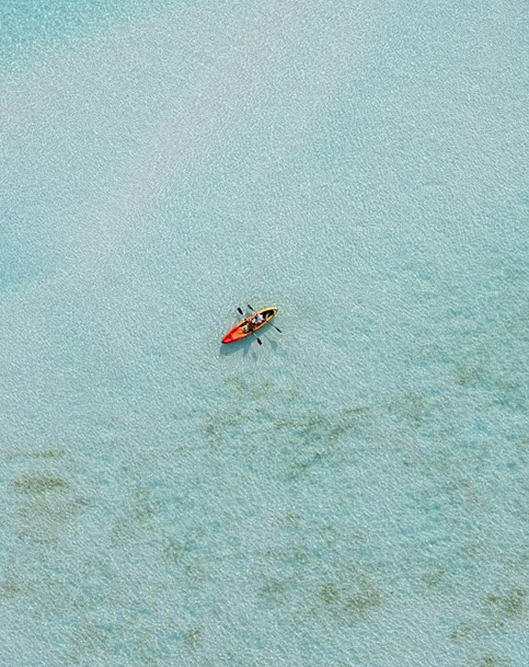a person in a kayak in the water