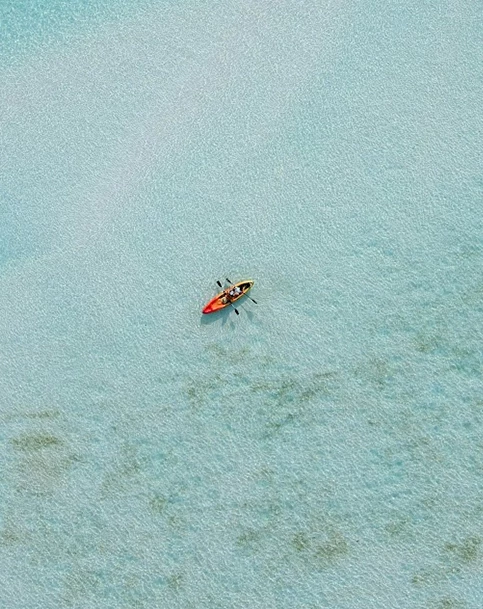 a person in a kayak in the water