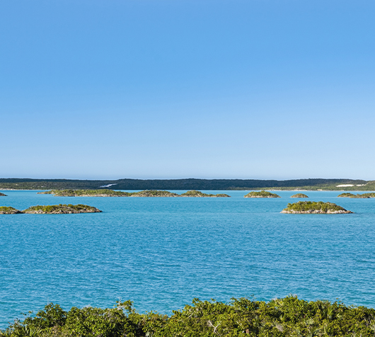 a body of water with small islands