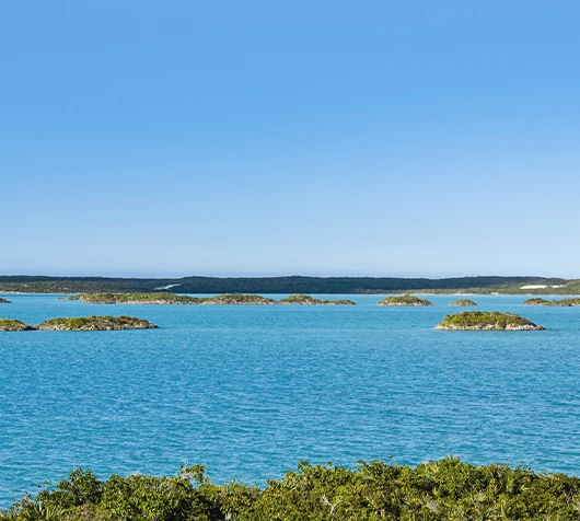a body of water with small islands