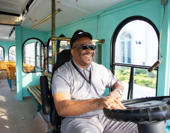 a man driving a bus