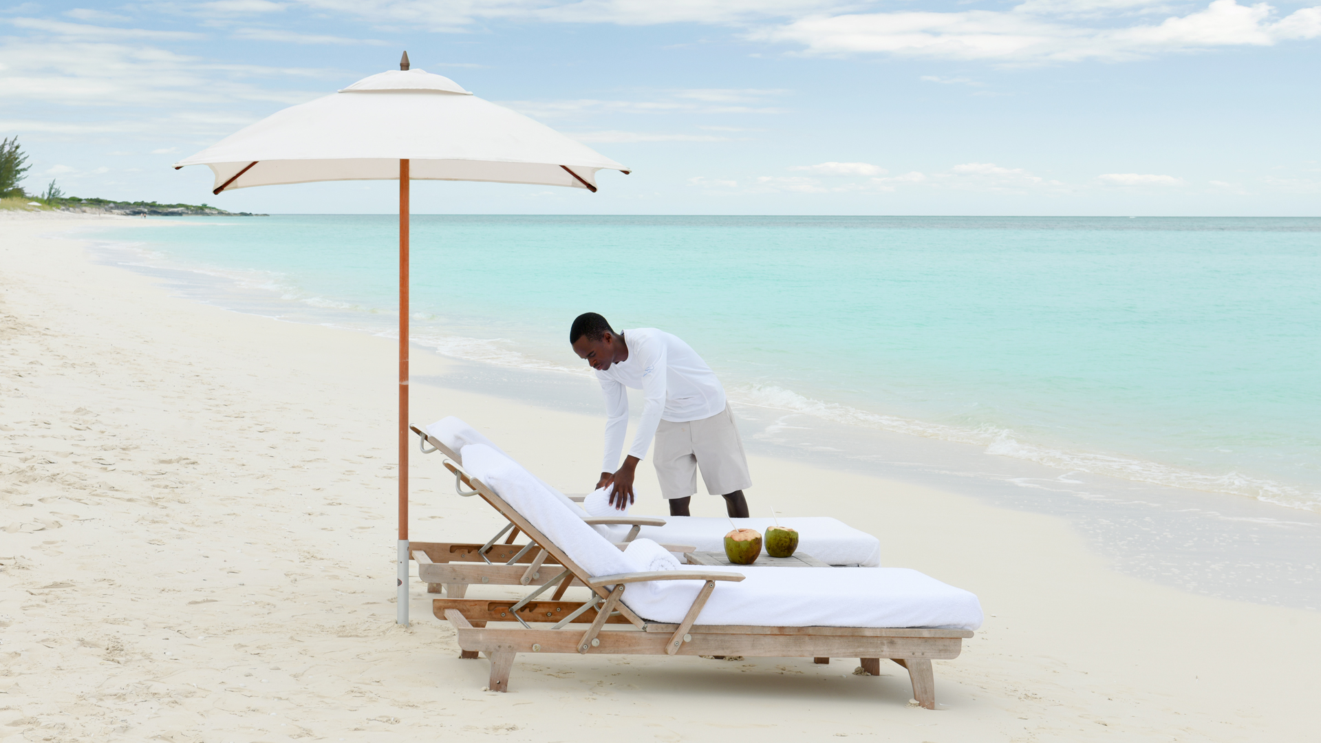 a man cleaning a beach chair