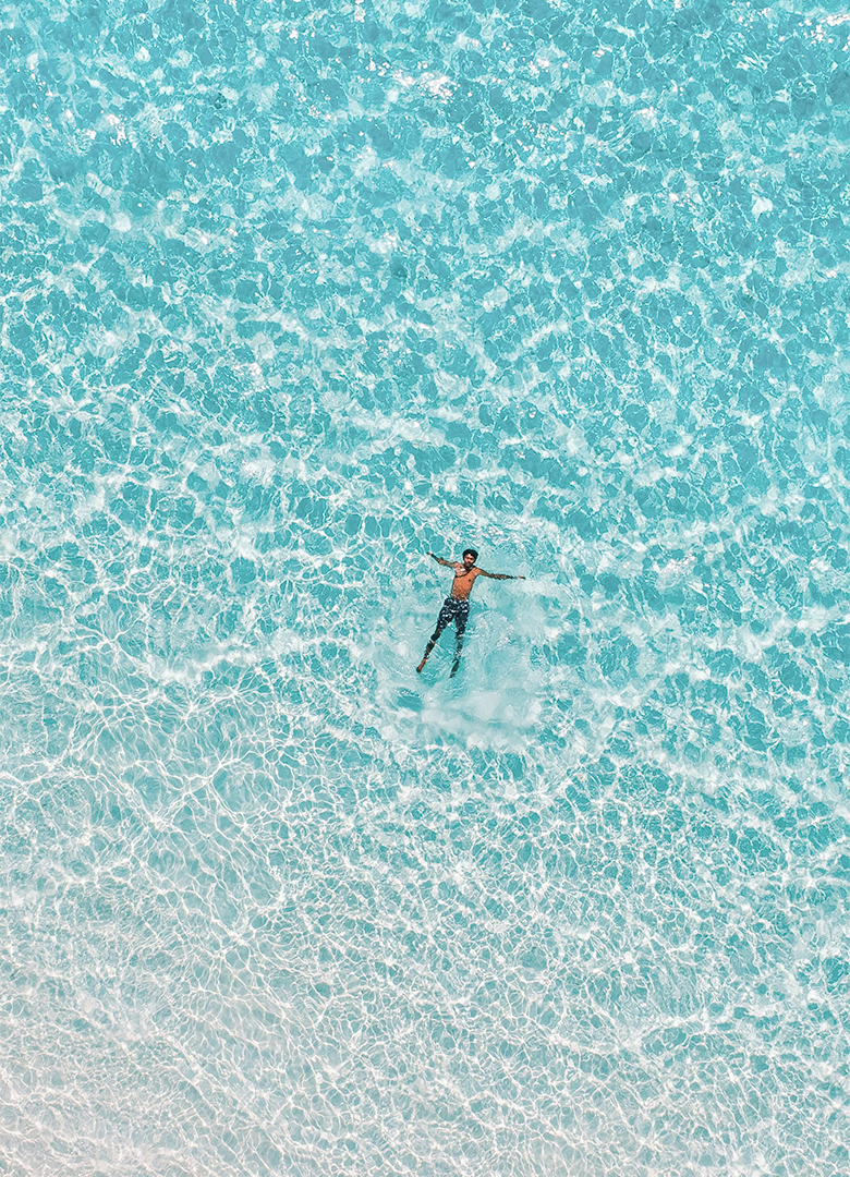 a person swimming in the water