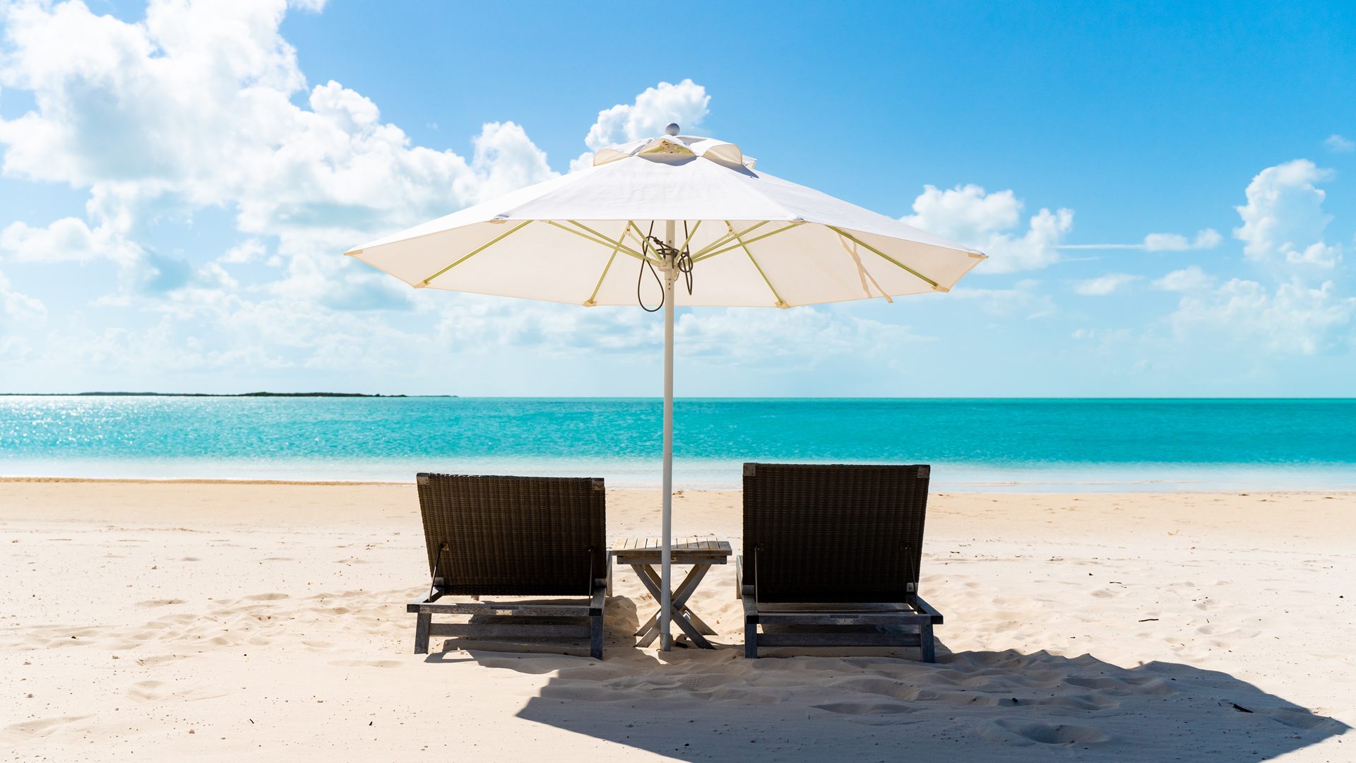 chairs and umbrella on a beach
