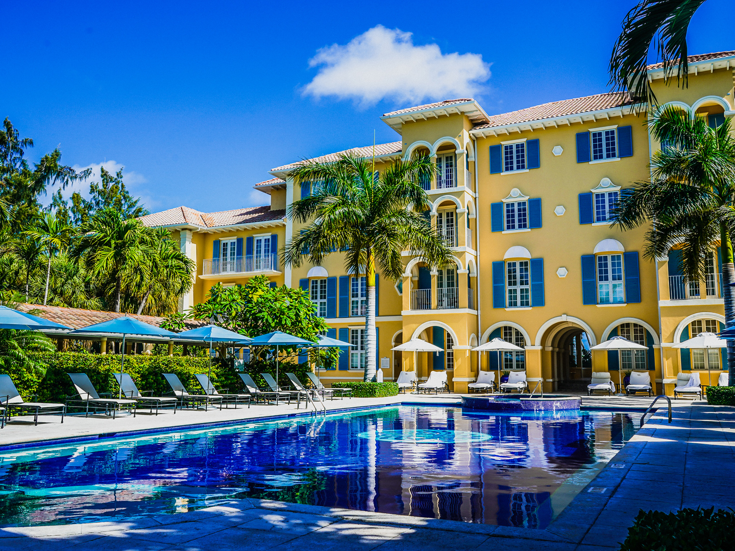 a pool in front of a building