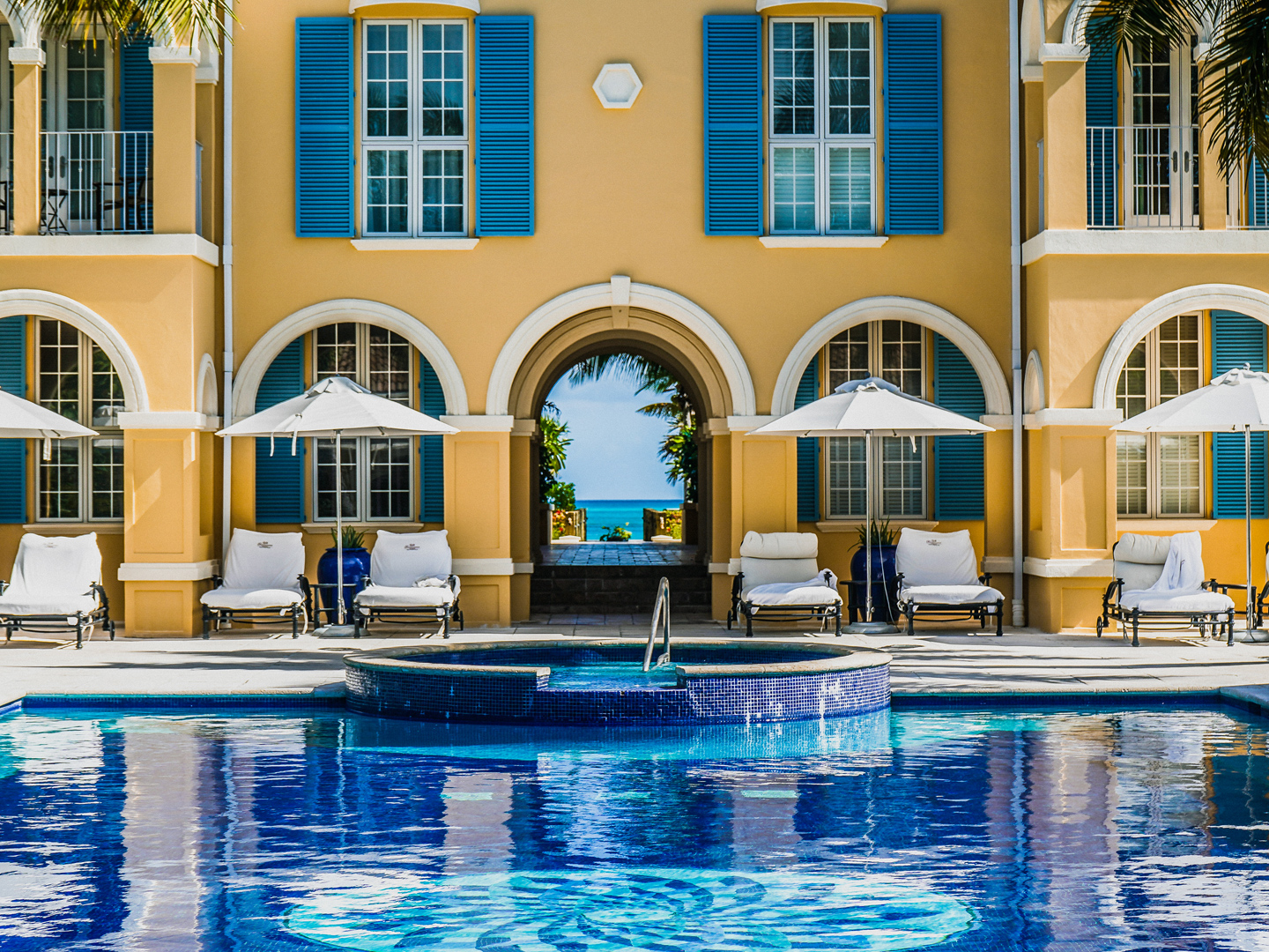 a pool in front of a building