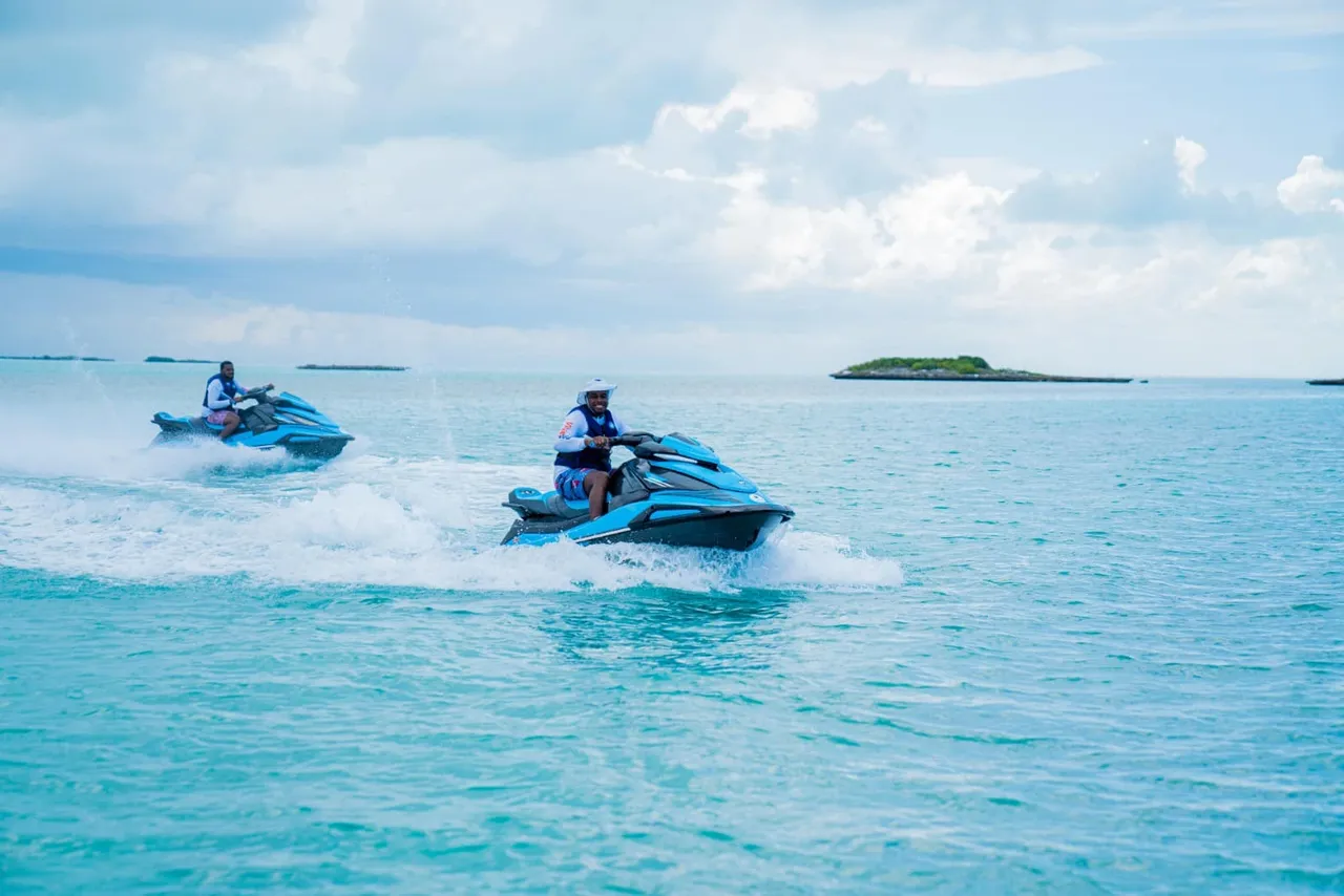 a group of people on jetski