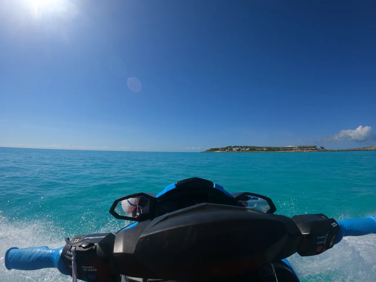 a person on a jet ski in the ocean